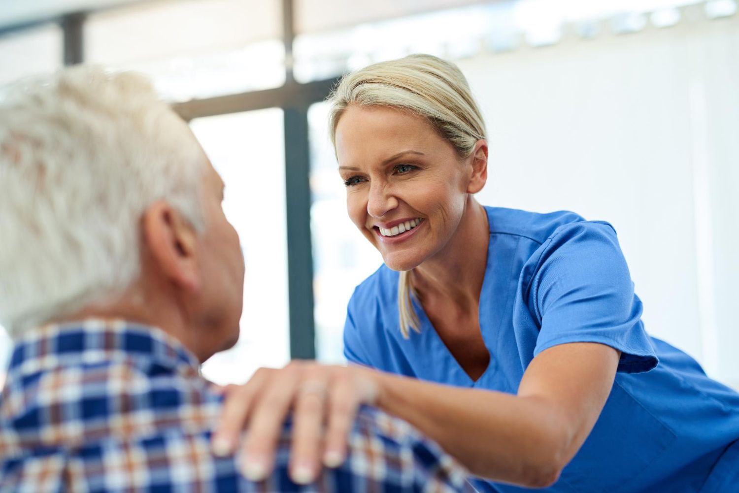 A Harbor caregiver supporting a resident