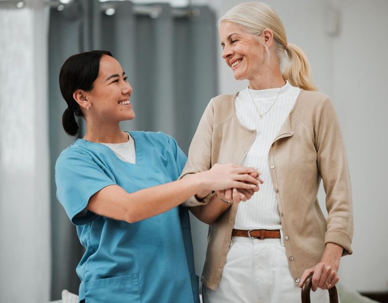 A Harbor caregiver with a resident